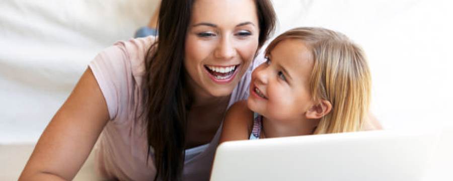 Mother searching online insurance for her daughter